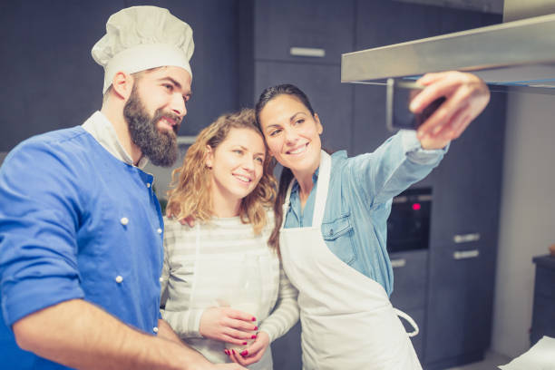 istock People in a cooking class enjoying their time 923614066
