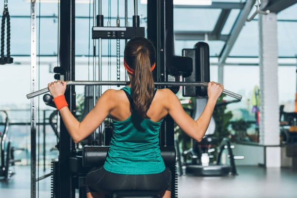 istock sporty woman working out on training apparatus 923616704