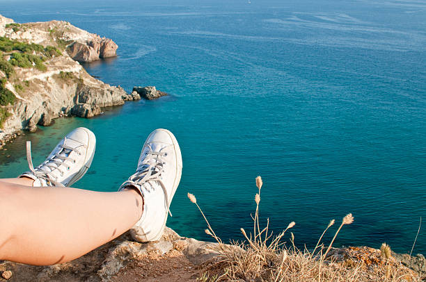 istock traveller's feet in sneakers 92361825