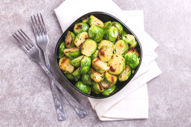 istock Vegetarian cuisine. Brussels Sprouts roasted with olive oil. Copyspace 923622278