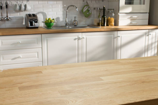 Wooden table in the kitchen Wooden table in the kitchen domestic kitchen stock pictures, royalty-free photos & images