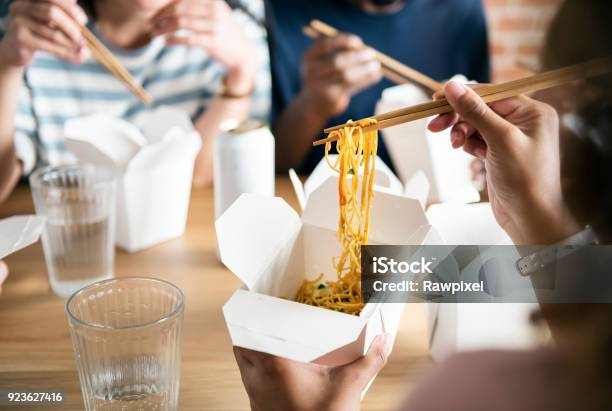 Friends Eating Chow Mein Together Stock Photo - Download Image Now - Take Out Food, Eating, Noodles