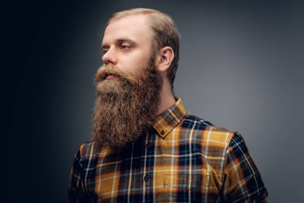 istock Redhead male dressed in a yellow hipster shirt. 923629580