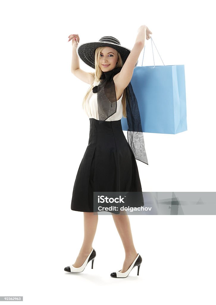 Блондинка шляпа в стиле ретро с голубой покупки мешок#2 - Стоковые фото Беззаботный роялти-фри