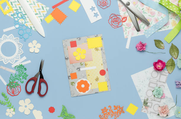 istock Abstract a home-made postcard from scraps of colored paper. Scrapbooking, creative mess 923630120