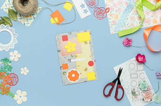 istock Homemade postcard from multi-colored paper scraps. Scrapbooking, creative mess 923630134
