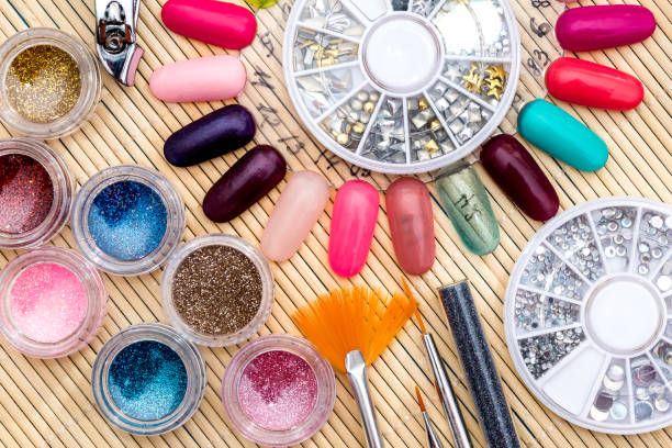 istock different colors of varnish, sparkles, crystals for nails 923633924