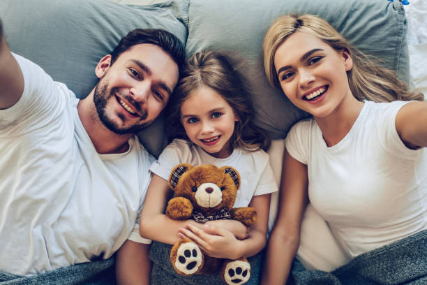 Family in bedroom