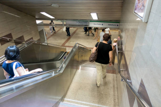 People Trying Not To Miss Subway Using Stairs stock photo
