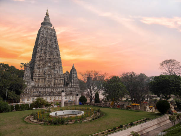 The side view of the stupa at Mahabodhi Temple Complex in Bodh Gaya, India. The Mahabodhi Vihar is a UNESCO World Heritage Site. The side view of the stupa at Mahabodhi Temple Complex in Bodh Gaya, India. The Mahabodhi Vihar is a UNESCO World Heritage Site. stupa stock pictures, royalty-free photos & images