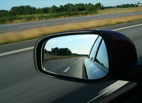 View through the rear mirror on a car