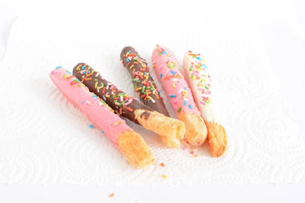 istock Sweet chocolate stick on white paper. 923638308