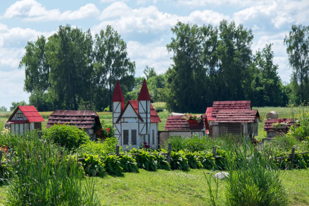 House in Big Green Garden for Rabbits Small Size Houses in Latvia Riga stock photo