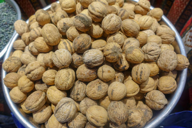 istock Dry pulses and dried vegetables, tomatoes, peanuts, walnuts, date 923639802