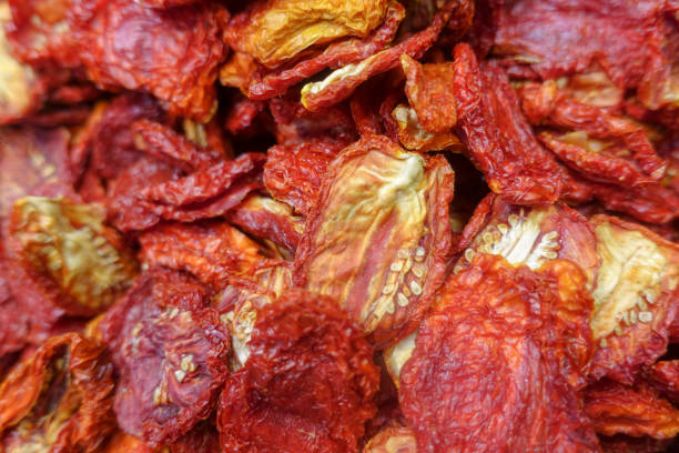 istock Dry pulses and dried vegetables, tomatoes, peanuts, walnuts, date 923640006