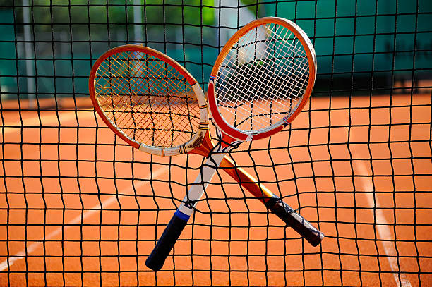 istock old tennis racket in the net 92364168