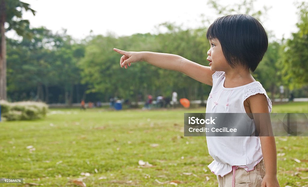 Girl pointing to something  Child Stock Photo