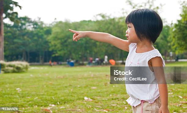 Girl Pointing To Something Stock Photo - Download Image Now - Child, Color Image, Direction