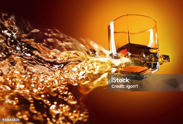 Glass Of Whiskey With Ice View From The Bottom Stock Photo - Download Image Now - Liquid, Bourbon Whiskey, Whiskey