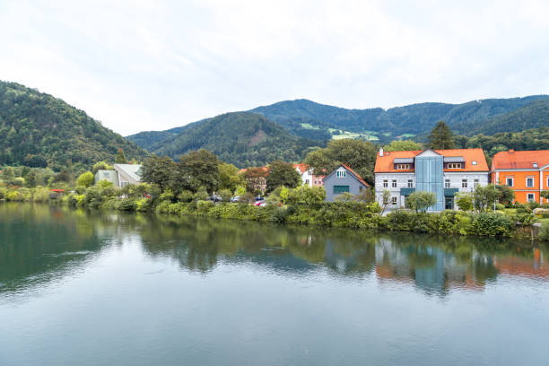 Frohnleiten by Mud River in Styria Frohnleıten: Old town view of small city Frohnleiten near Mur River in Styria region of Austria. frohnleiten stock pictures, royalty-free photos & images