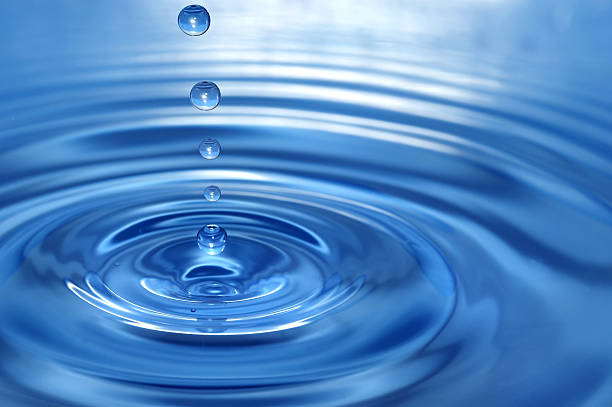 istock round transparent drop of water, falls downwards. 92365157