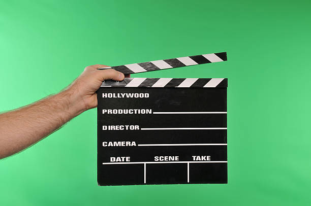 istock A movie clapper held in front of a green screen  92365265