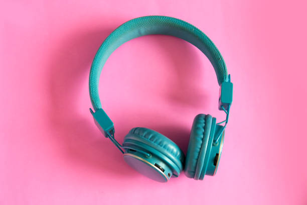 istock Blue headphone on light pink background,vintage or pastel concept 923652742