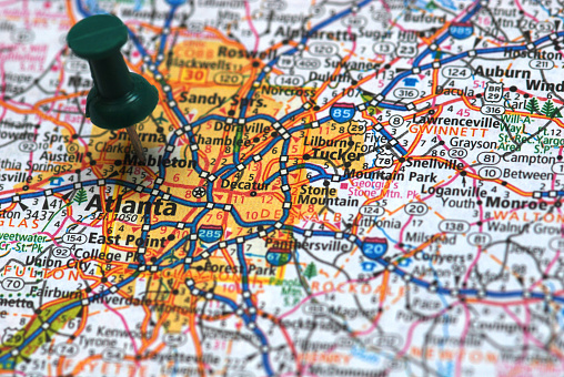 Krakow, Poland, Europe. Push pin on an old map showing travel destination. Selective focus.