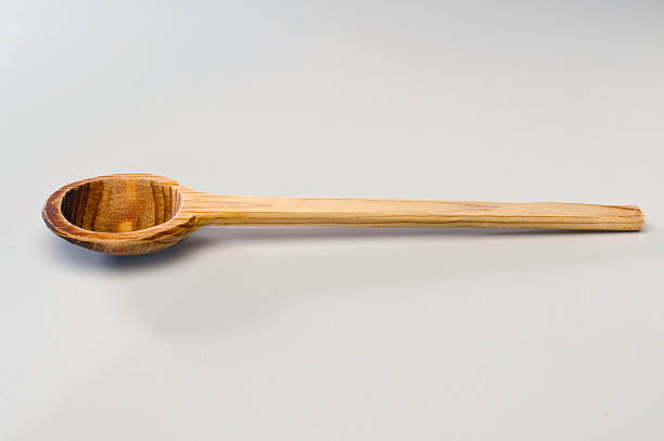 istock old carved wooden spoon 92365658