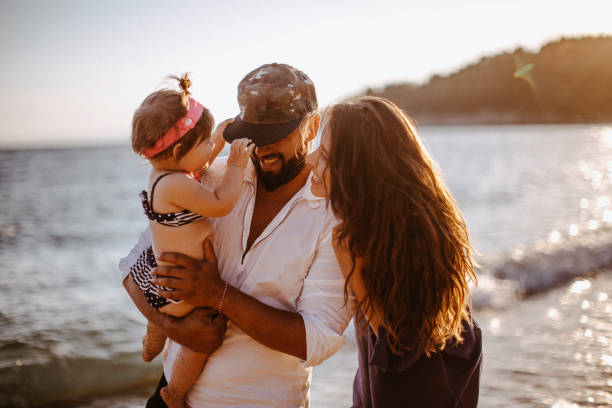 istock Beautiful family have fun on the beach 923656618