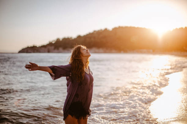 istock Happy girl at the beach 923663350