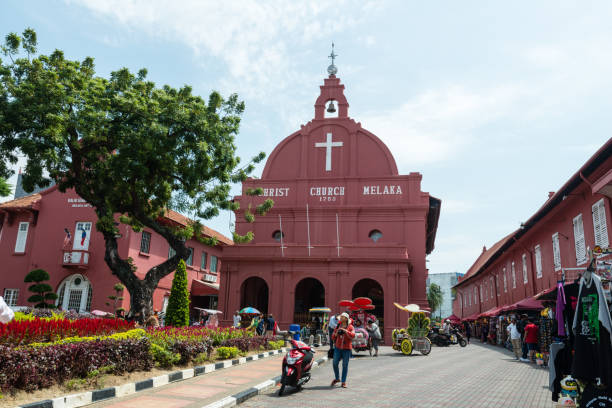christ church melaka in malacca, malaysia - cyclo cross imagens e fotografias de stock