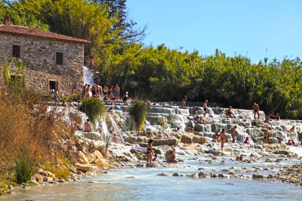 natural spa with waterfalls and hot springs at saturnia thermal baths, tuscany, italy. - waterfall health spa man made landscape imagens e fotografias de stock