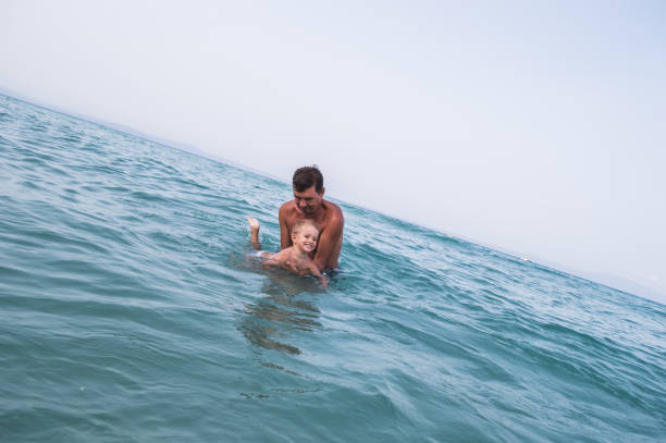 istock Swimming with my grandpa 923670644
