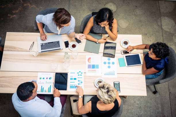 istock Group of financial professionals preparing tax paperwork 923671348