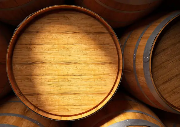 Photo of barrels of wine and Pisco in cellar