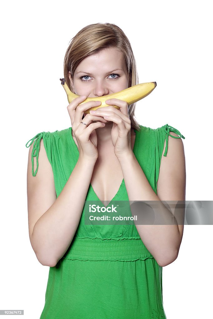 Schönes Mädchen hält banana wie ein Lächeln - Lizenzfrei Abnehmen Stock-Foto