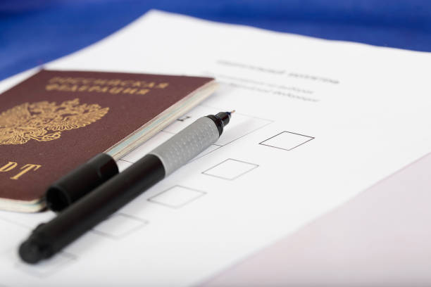 istock Black pen on ballot paper. 923674984