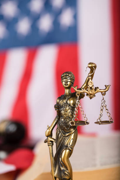 istock Statue of Themis in front of American flag 923675246
