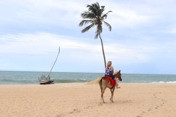 istock Senior woman horseriding 923675328