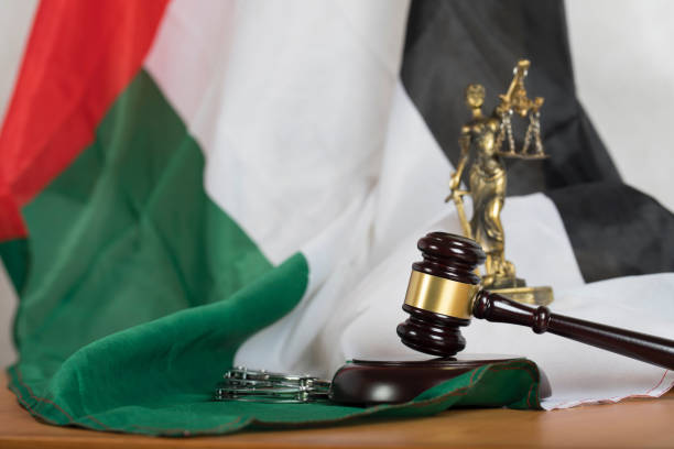 judge's gavel on a flag of the united arab emirates. - sharia imagens e fotografias de stock