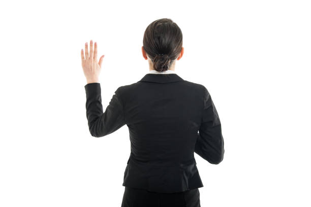 istock Back view of female flight attendant taking oath 923678940