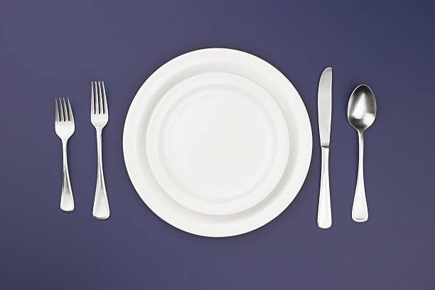 istock A picture of a dinner plate setting with a white plate 92369409