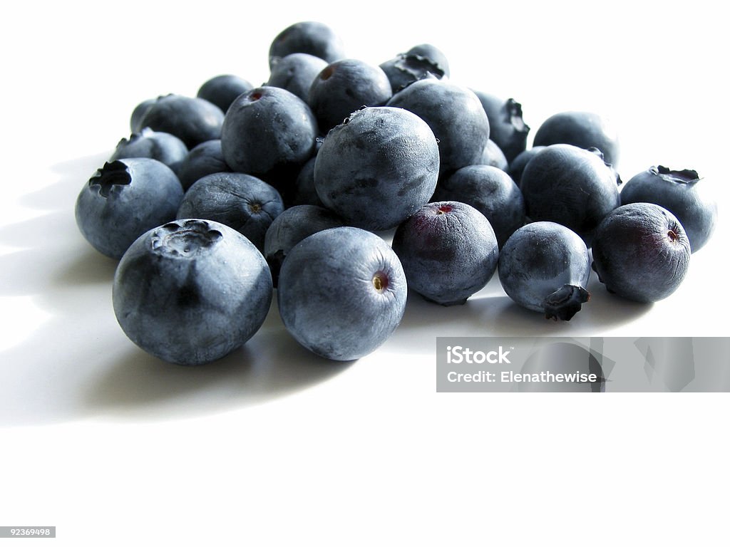 Blueberries on white  Berry Fruit Stock Photo