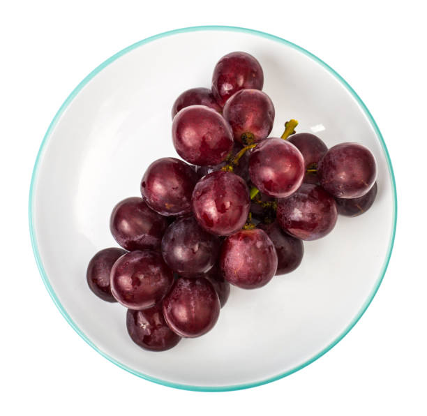 istock Bunch of red grapes on plate 923705088