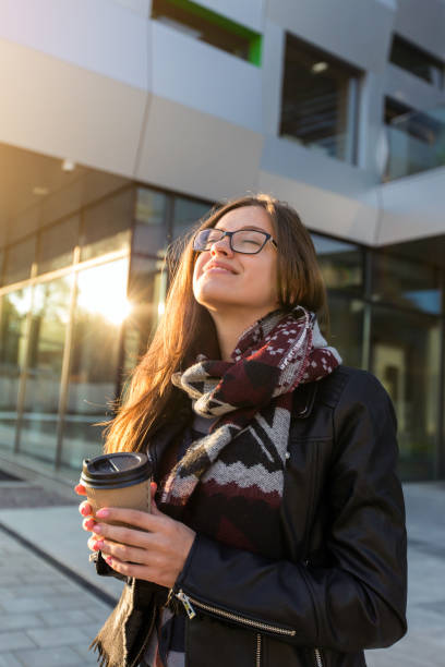 istock Young female student have coffee to go 923705268