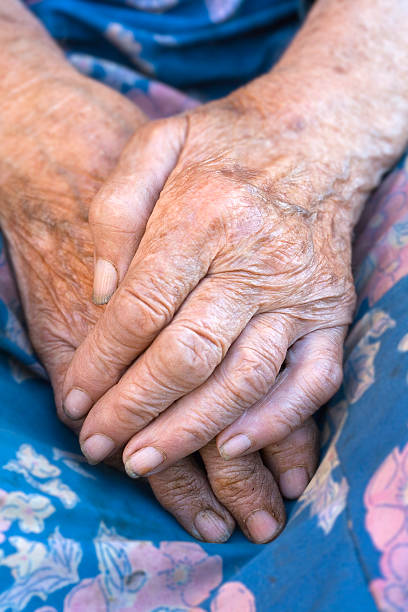 istock close of old womans hands 92370539