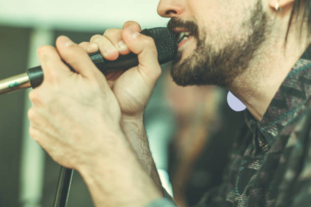 istock Band playing in their rehearsal studio: solo singer 923710078