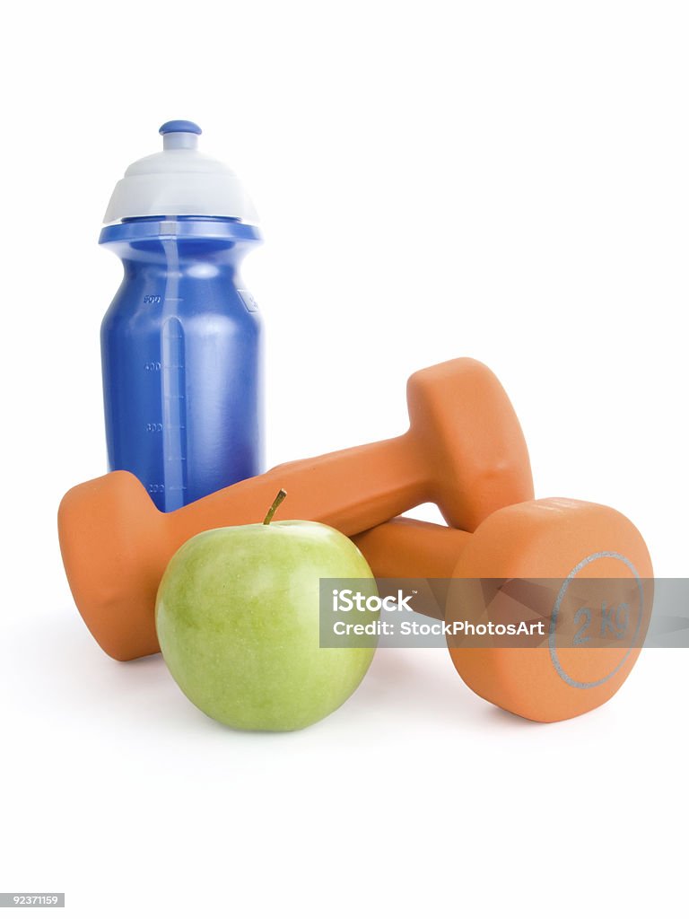 Fitness dumbbell, water bottle and apple  Bottle Stock Photo