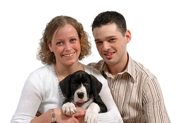 Photo of Young couple and dog